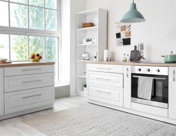 Interior,Of,Kitchen,With,White,Counters,And,Oven